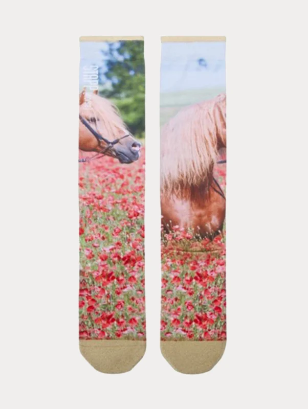 Stijlvolle paardrijsokken van StappHorse met de print van bloemen en een paard.